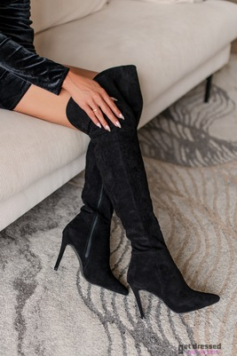 Mustad ülepõlve saapad